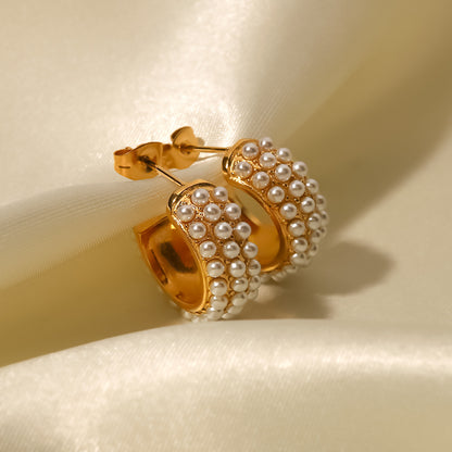 C-shaped white pearl earrings