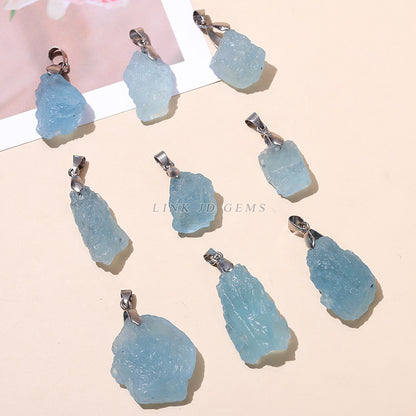 Aquamarine irregular rough stone pendant.
