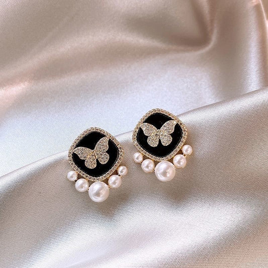 Black square butterfly stud earrings