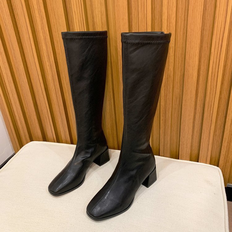 Black and white high boots for women