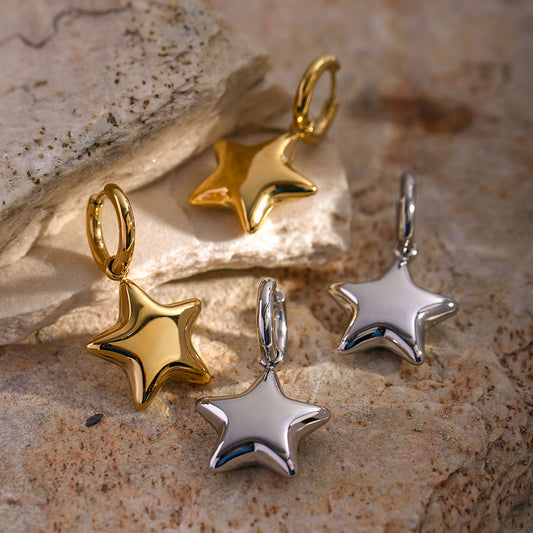 Pendientes tridimensionales de estrella de cinco puntas 