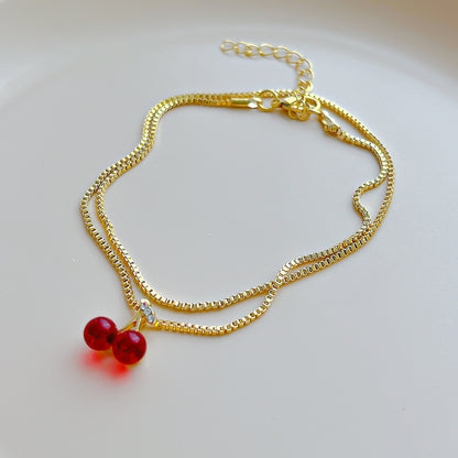 Collar con colgante de cereza roja 