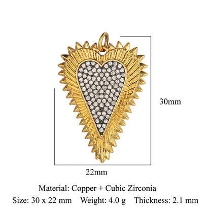 Colgante de cobre y circonita con forma de llave y corazón de melocotón 