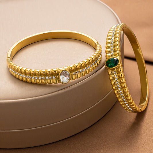 Brazalete vintage de acero inoxidable con circonitas verdes 