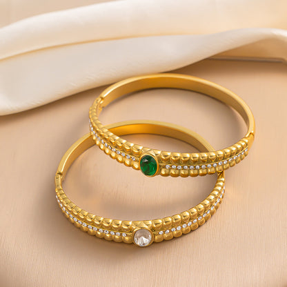 Brazalete vintage de acero inoxidable con circonitas verdes 
