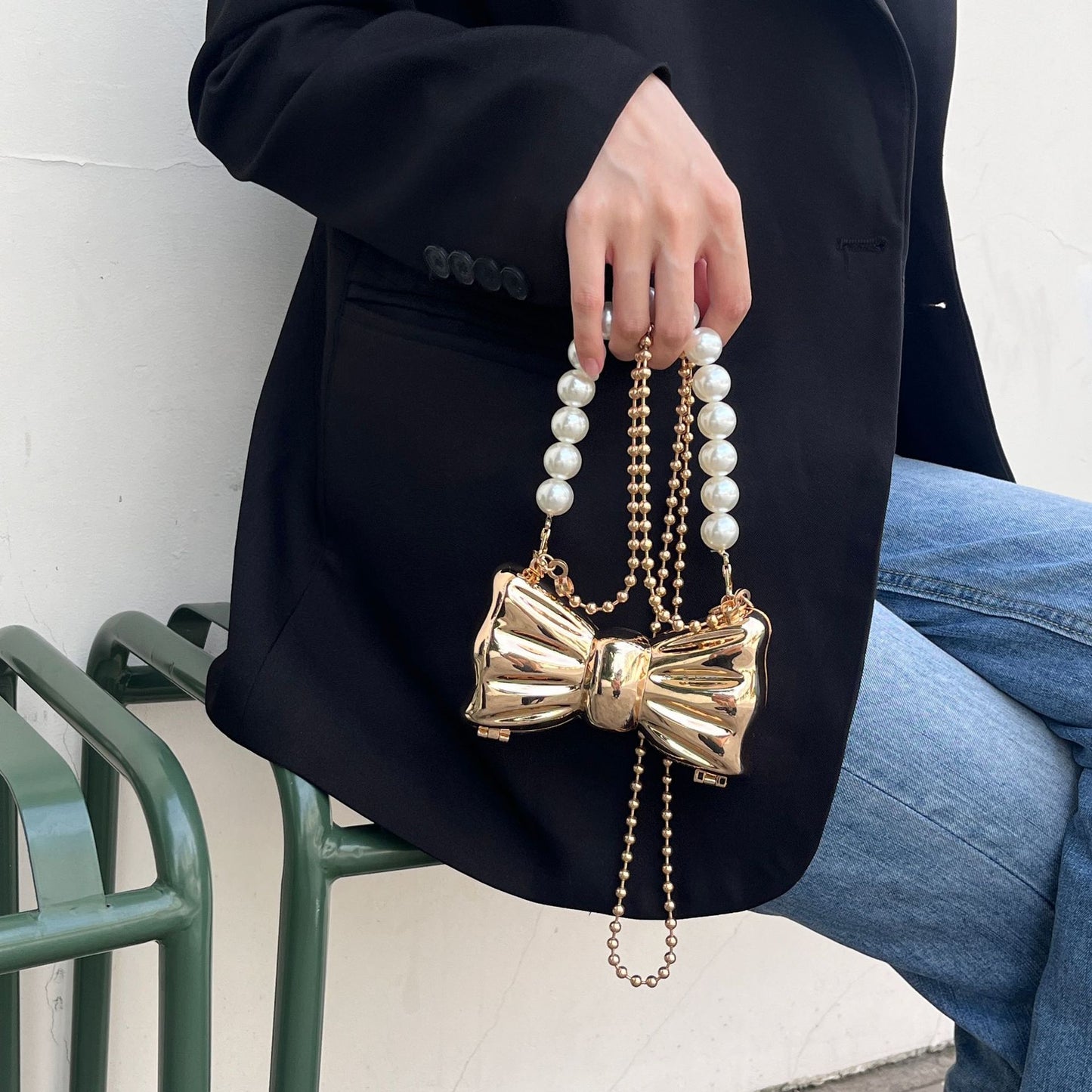 Bow metal earphone bag