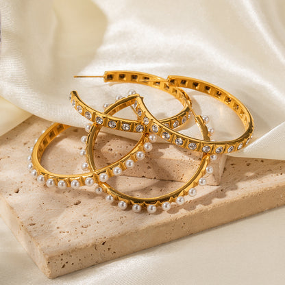 C-shaped exaggerated full pearl earrings