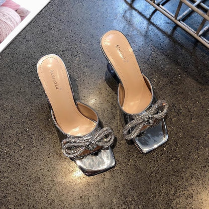 Crystal and slippers woman