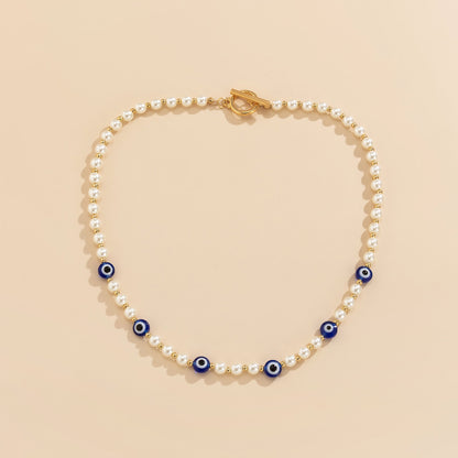 Collar de ojo de perla de imitación empalmado 