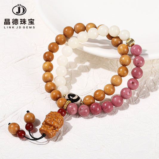 Pulsera de doble anillo con piedra roja Bodhi y jade blanco. 