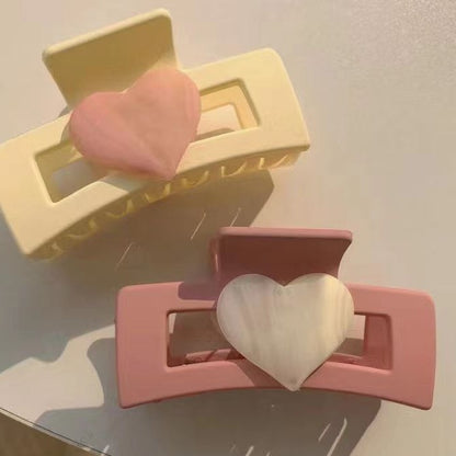 Garra de corazón rosa 