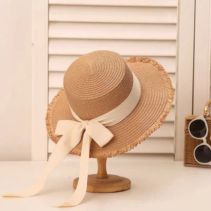 Sombrero de paja con lazo de tendencia para mujer, sombrero de ala plana tejido para vacaciones de verano 