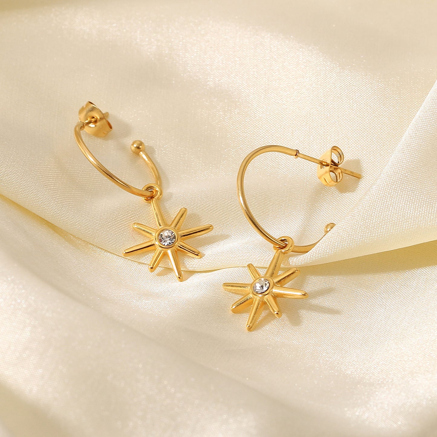 Gold C-shaped six-pointed star pendant earrings