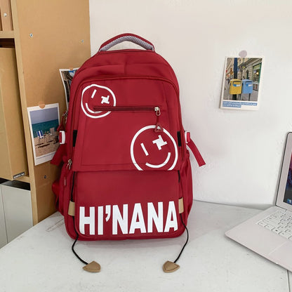 Backpack with smiley face print
