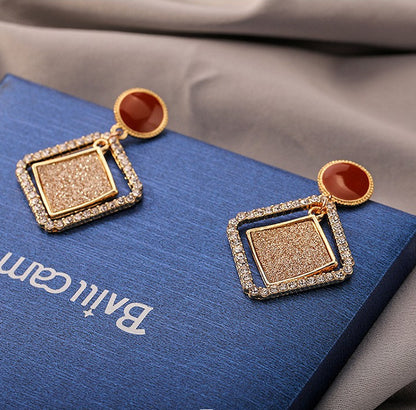 Pendientes de rombos dobles huecos 