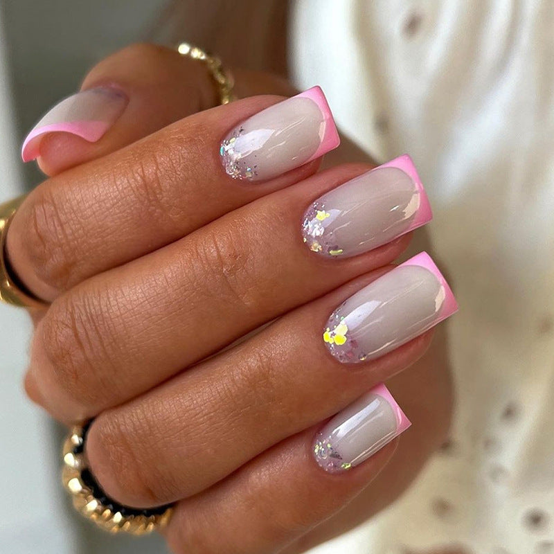 Uñas postizas francesas de longitud media cuadradas en color rosa melocotón 