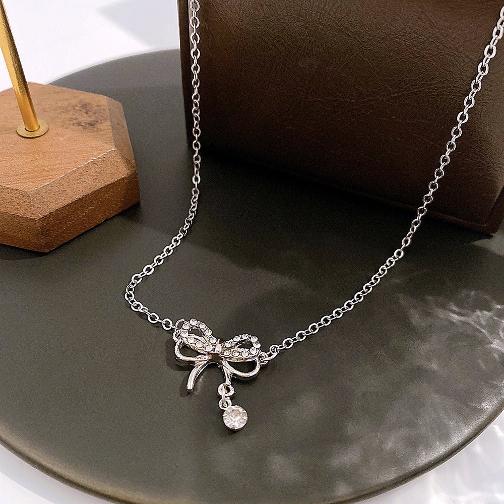 Diamond Bow Pendant Necklace