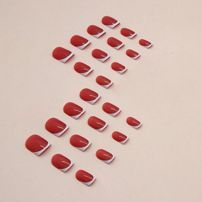 Uñas postizas francesas Aurora cortas en rojo y blanco 