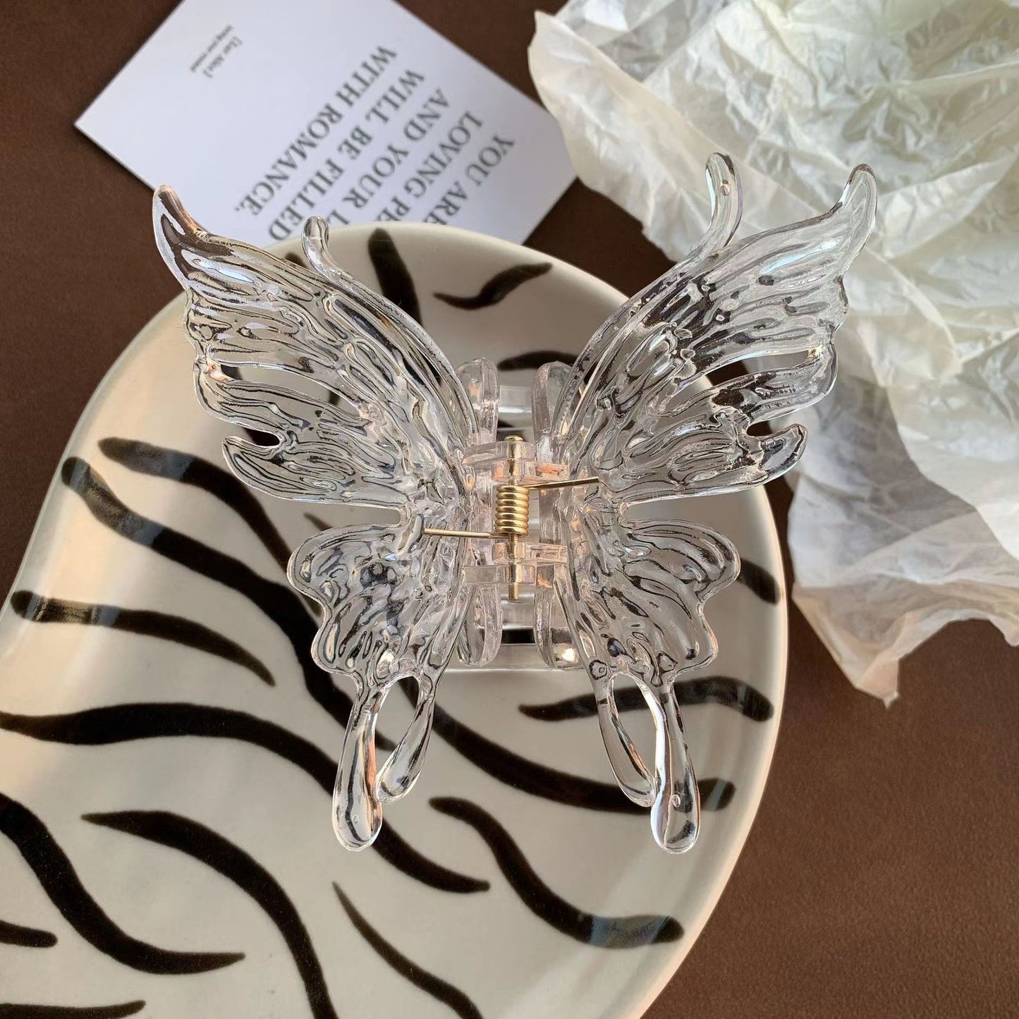Pinza de agarre con forma de mariposa tridimensional 