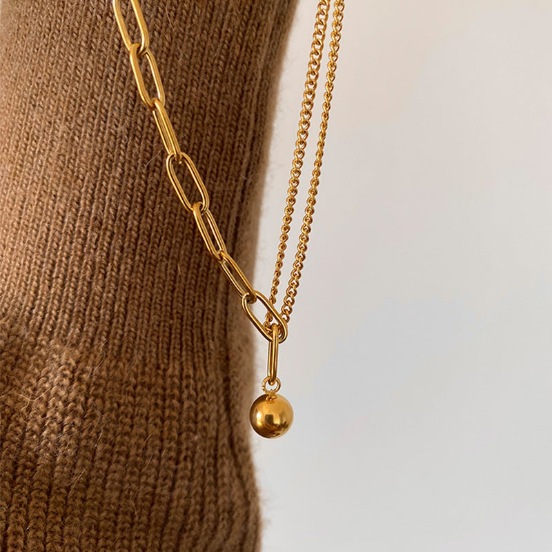 Splicing golden ball necklace