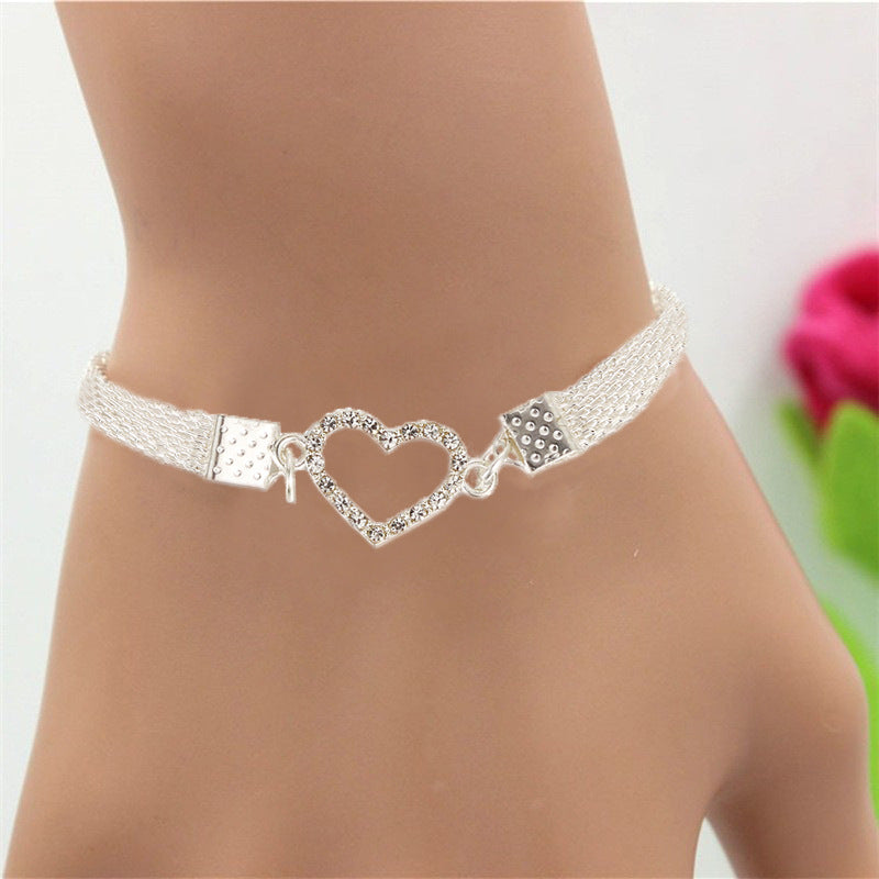 Cross-border new European and American fashion high-end butterfly peach heart bracelet fashion niche temperament silver point diamond bracelet