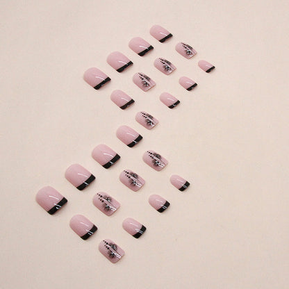 Uñas postizas cortas con pétalos franceses 