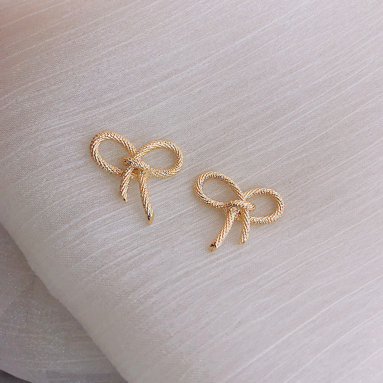 Bow earrings metal