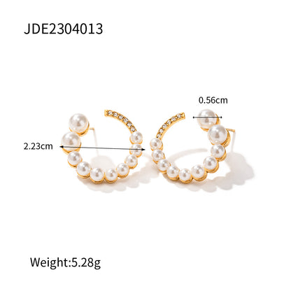C-shaped earrings with full diamonds and pearls