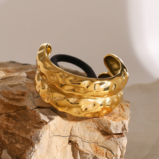 Diadema de acero de titanio dorada 