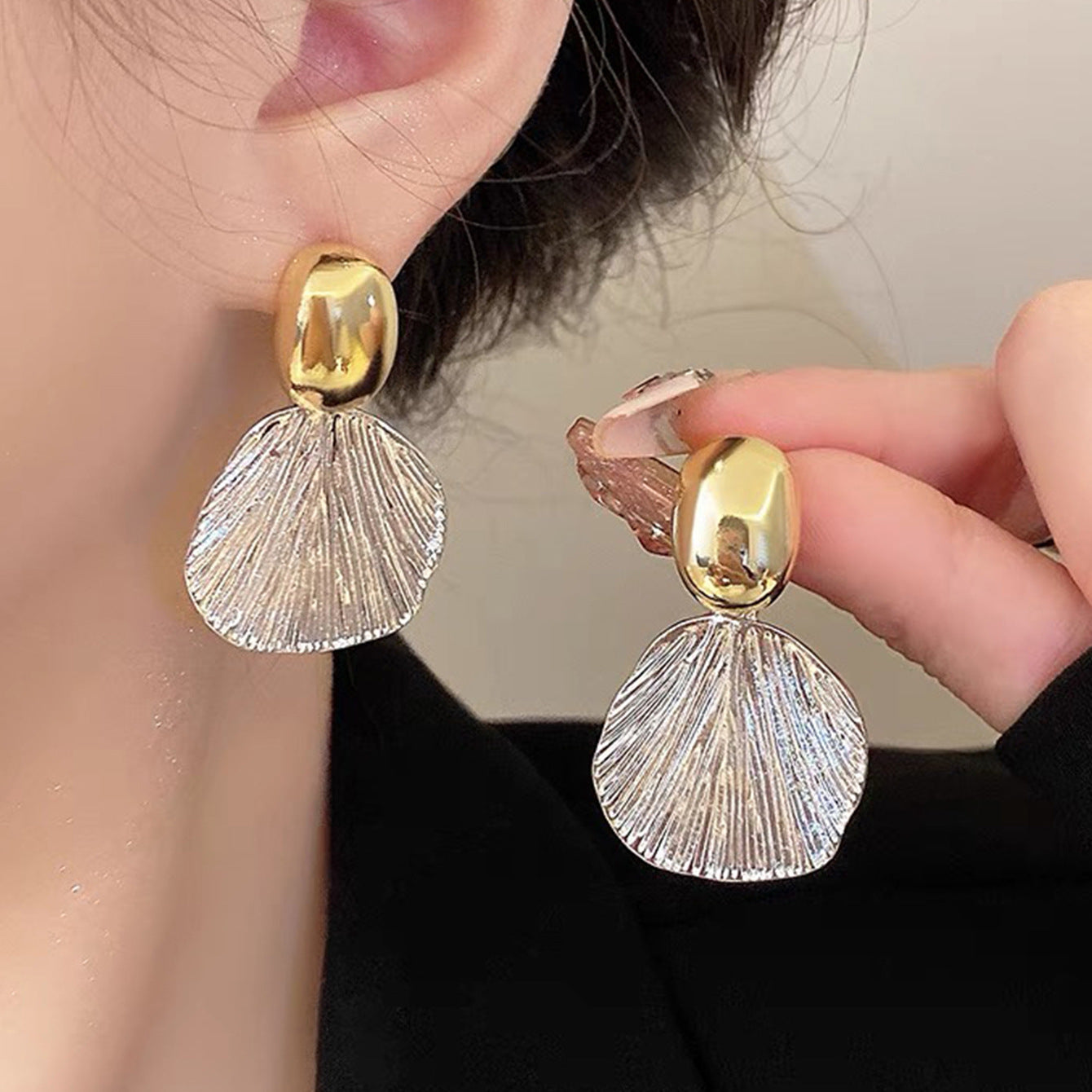 Pendientes con diseño de conchas