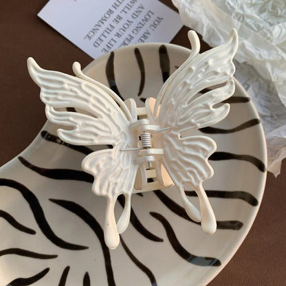 Pinza de agarre con forma de mariposa tridimensional 