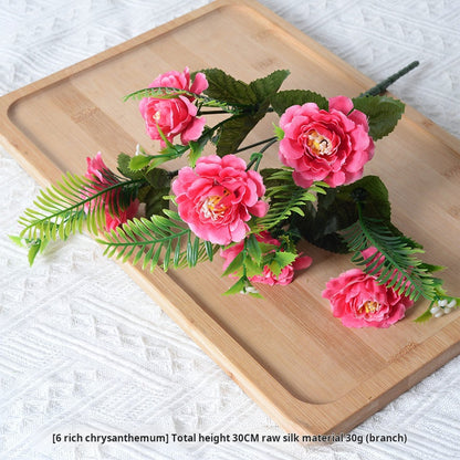 Artificial rose red and orange flowers
